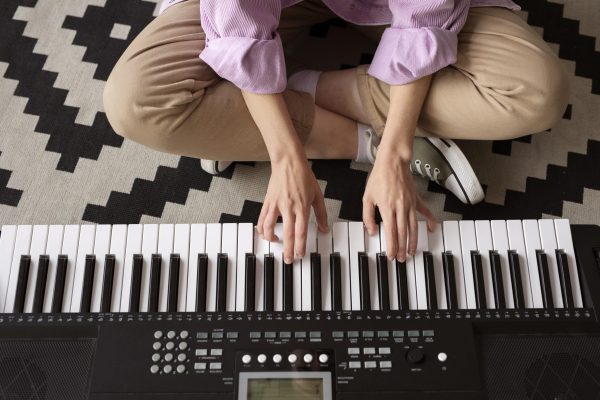 close-up-hands-playing-piano